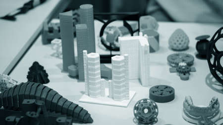 Many abstract models bright colorful objects printed on a 3d printerの写真素材