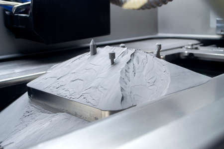 Surface with printed objects on metal 3D printer, covered metal powderの写真素材