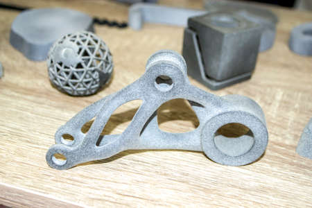 Different abstract model printed on 3d printer from powder close-up 3D prototypeの写真素材