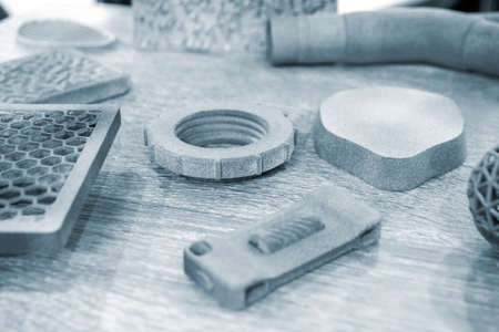 Different objects printed on industrial powder 3D printer. Multi Jet Fusion