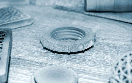 Different Gray objects printed on powder industrial 3D printer.の写真素材