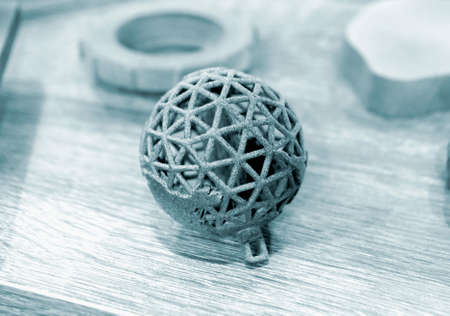Gray abstract models printed on 3d printer from powder close-up.の写真素材