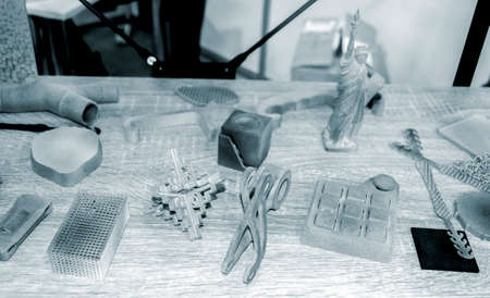 Gray abstract models printed on 3d printer from powder close-up. 3D prototypeの写真素材