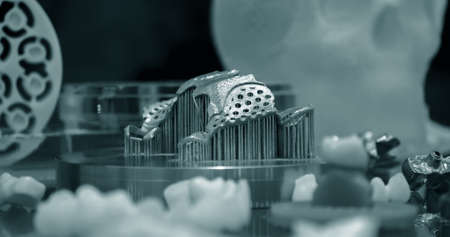 Object with supports created on a laser sintering machine on the work disk.の写真素材