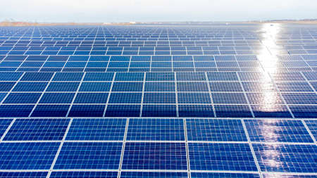 Aerial drone view flight over solar power station panels. Top view of solar farmの写真素材