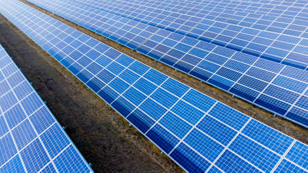 Aerial drone view flight over solar power station panels. Aerial top viewの写真素材