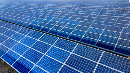 Aerial drone view flight over solar power station panels. Aerial top viewの写真素材