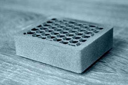 Gray object printed on powder 3D printer. Multi Jet Fusion MJF. Powderの写真素材