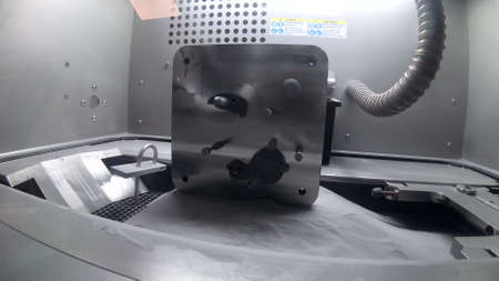 Platform with Objects Printed From Metal Powder Stands in Working Chamberの写真素材