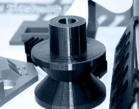 Objects printed on 3D printer from plastic close-up. New 3D printing technology.