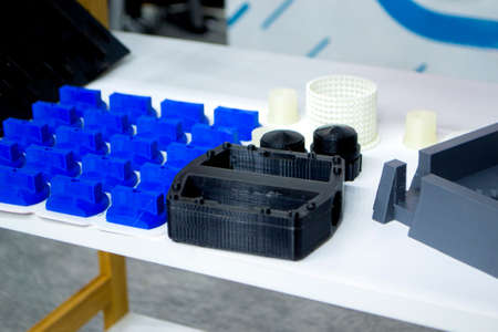 Objects printed on 3D printer from plastic close-up. New 3D printing technology.