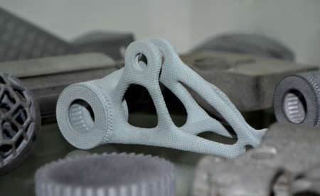 Gray object printed on powder industrial 3D printer. Three-dimensionalの写真素材
