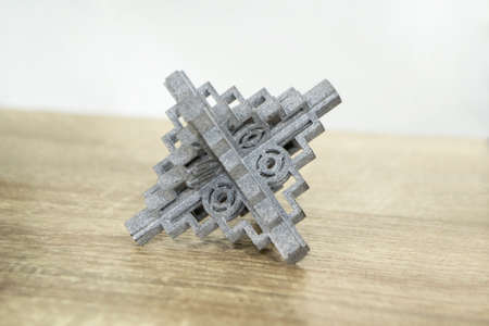 Gray abstract models printed on 3d printer from powder close-up.の写真素材