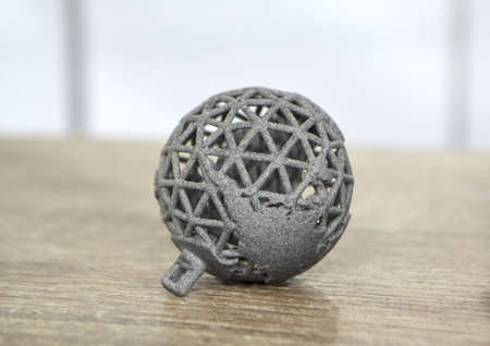 Gray object printed on powder 3D printer. Multi Jet Fusion MJF. Powderの写真素材