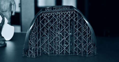 Abstract object of black color printed with supports on 3d printer.の写真素材