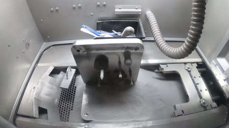 Platform with Objects Printed From Metal Powder Stands in Working Chamberの写真素材