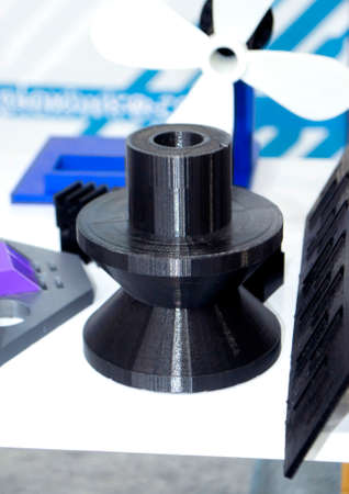 Objects printed on 3d printer made of white plastic close-up.の写真素材