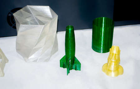 Objects printed on 3d printer made of white plastic close-up.の写真素材