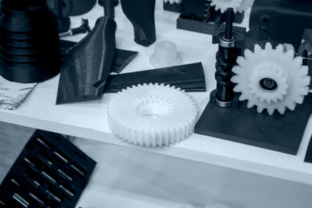 Objects printed on 3d printer made of white plastic close-up.の写真素材