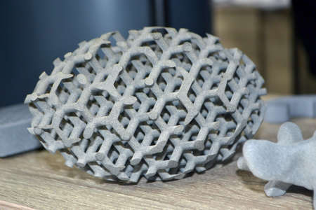 Gray abstract model object printed on 3d printer from powder close-upの写真素材