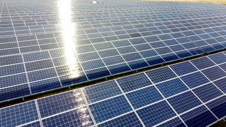 Aerial drone view solar panels on sunny day close-up. Photovoltaic solar panelの写真素材