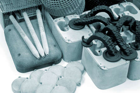 Many different objects printed on 3D printer from powder polyamide.の写真素材