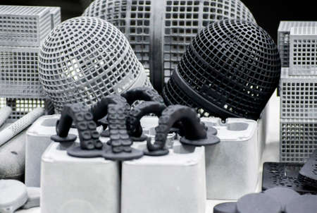 Many different objects printed on 3D printer from powder polyamide.の写真素材