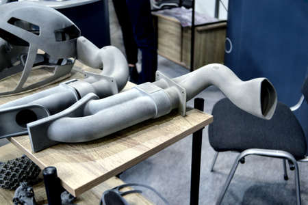 Many different objects printed on 3D printer from powder polyamide.の写真素材