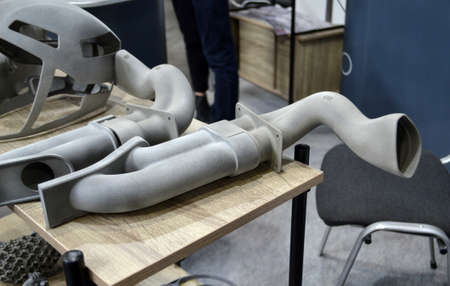 Many different objects printed on 3D printer from powder polyamide.の写真素材