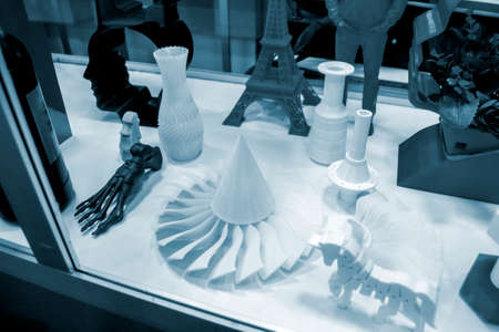 Blue models prototypes printed on a 3D printer from plastic close-upの写真素材