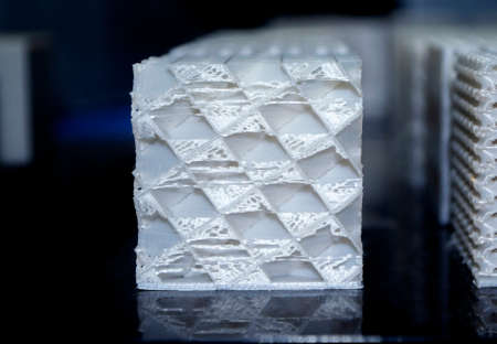 White models prototypes printed on a 3D printer from plastic close-upの写真素材