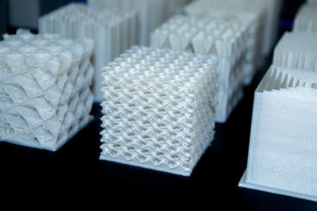 White models prototypes printed on a 3D printer from plastic close-upの写真素材