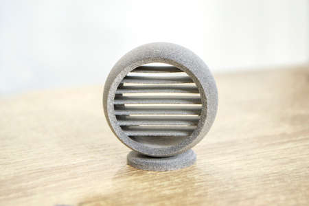 One model printed on 3D printer. Gray object printed on 3D printer made plasticの写真素材