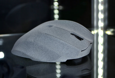Gray computer mouse printed on 3D printer. Model printed on 3D printerの写真素材