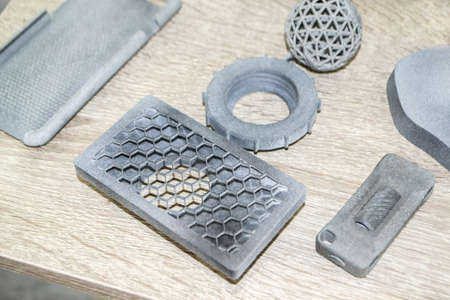 Many models gray printed on 3D printer. Gray objects printed on 3D printerの写真素材