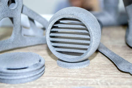 Many models gray printed on 3D printer. Gray objects printed on 3D printerの写真素材