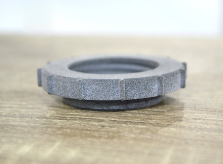 Model printed on 3D printer. Gray object printed on 3D printer made of plasticの写真素材