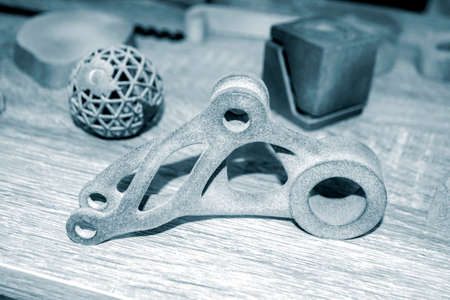 Model printed on 3D printer. Gray object printed on 3D printer made of plasticの写真素材
