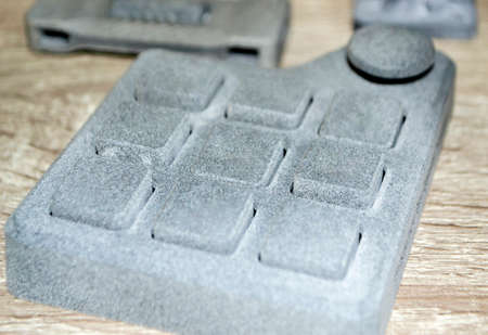 Model printed on 3D printer. Gray object printed on 3D printer made of plasticの写真素材