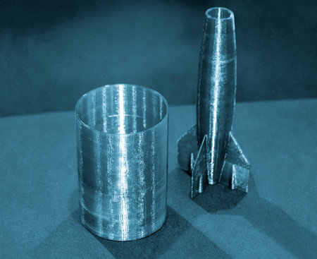 Model printed on 3D printer. Object printed on 3D printer made of plastic close-up. Prototype of shape made by 3d printer. 3D printed model. Concept new modern printing technologyの写真素材