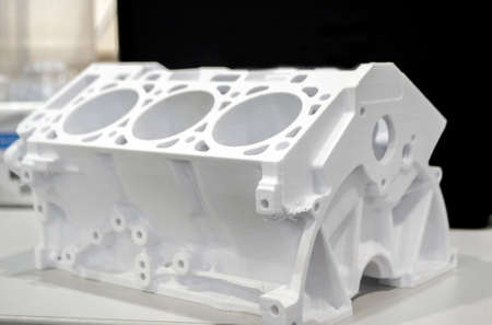 Model prototype car motor printed on 3D printer. Object printed on 3D printer made of plastic close-up. Prototype of shape made by 3d printer. 3D printed model. Concept new modern printing technologyの写真素材