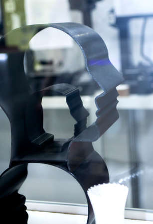 Black model printed on 3D printer from plastic close-up. New progressive additive modern 3D printing technology. Three-dimensional object created by high-precision 3D printing technologiesの写真素材