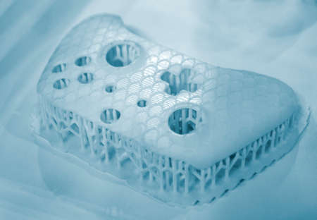 Model printed on 3D printer. Object printed on 3D printer made of plastic close-up. Prototype of shape made by 3d printer. 3D printed model. Concept new modern printing technologyの写真素材