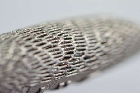 Models printed on 3D printer for metal macro. Object surface close-up. Layout created on metal 3D printer. New modern progressive additive 3D printing technology. Prototyping, Industrial productionの写真素材