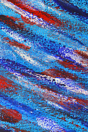Creative background of colorful brush strokes on canvas close up. Abstract art background from smeared brush strokes of blue, red, white colors macro. Drawing, painting paints texture surface backdropの写真素材