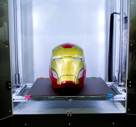 Art object printed on 3D printer inside 3D printer on desktop. New progressive additive modern 3D...