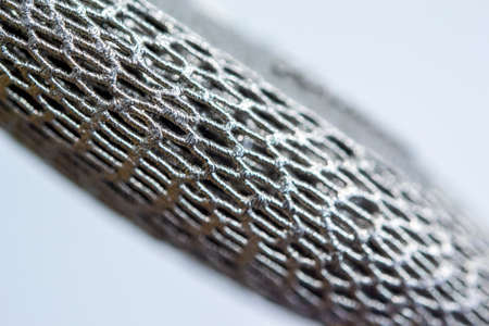 Model object of a large industrial part printed on a 3D printer from metal close-up. New modern progressive additive 3D printing technology. Industry factory plant manufacturing metalwork industrialの写真素材