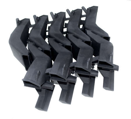 Models printed on 3D printer isolated on white background. Objects details printed on 3D printer from plastic close-up. Prototypes of shapes made by 3d printer. Concept new modern printing technologyの写真素材