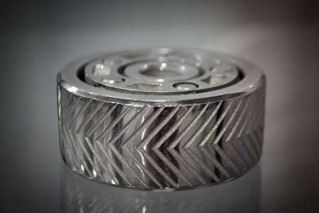 Object printed on metal 3d printer close-up. Object printed in laser sintering machine. Modern 3D printer printing from metal powder. Concept progressive additive DMLS, SLM, SLSの写真素材