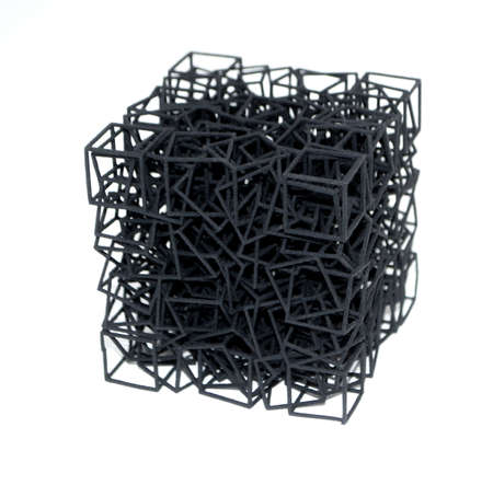 Model printed on 3D printer isolated on white background. Object detail printed on 3D printer from black plastic close-up. Prototype of shape made by 3d printer. Concept new modern printing technologyの写真素材
